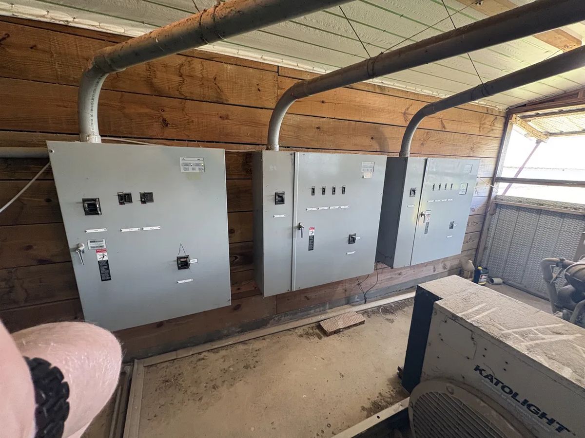 poultry house equipment, environmental control panels in the equipment room